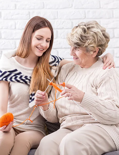 A carer supporting a client at home